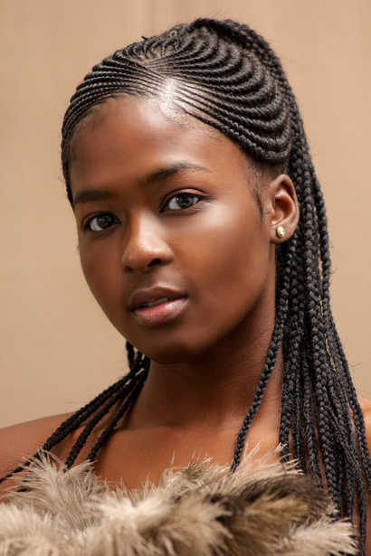 Beautiful Young Woman with Braided Hair